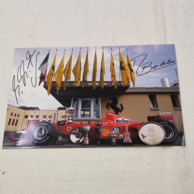 Foto con firme Schumacher e Barrichello