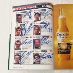 Poster e locandine moto e piloti anni da 70 a 00 di cui 5 con autografo 2