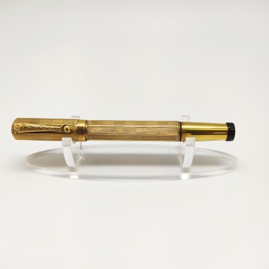 Penna stilografica vintage con pennino a scomparsa, fusto in metallo dorato