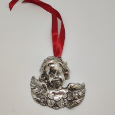 Angioletto putto in argento con nastro di sospensione