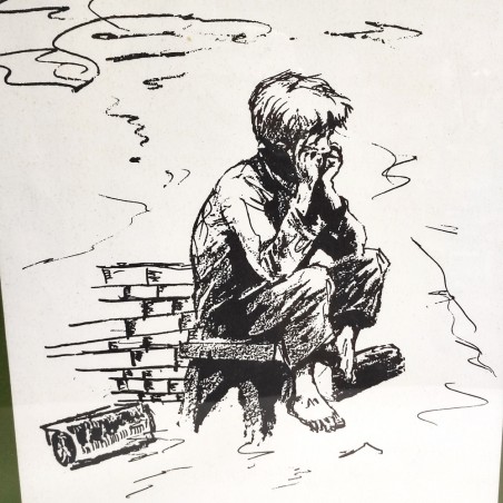 China su carta ragazzo scalzo seduto