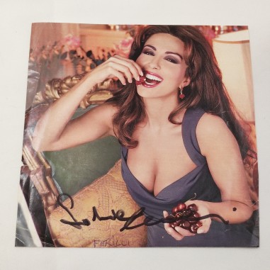 Sabrina Ferilli autografo su foto ritaglio di rivista