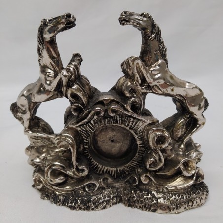 Coppia di cavalli su base decorata bagnatura in argento con alloggio orologio