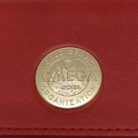 Confezione orologio Omega rossa con dettaglio logo dorato e interno bianco