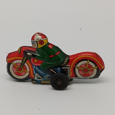 Motocicletta giocattolo in latta colorata anni 50/60. Segni sulla latta