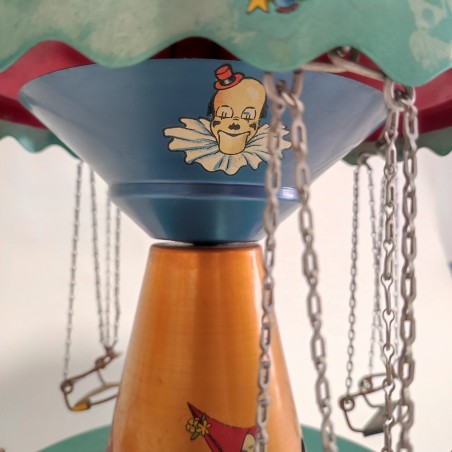 Giocattolo in latta giostra bambini seggiolini volanti 22x34 cm