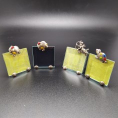 Lotto di 4 piccole cornici portafoto con elementi in argento 800