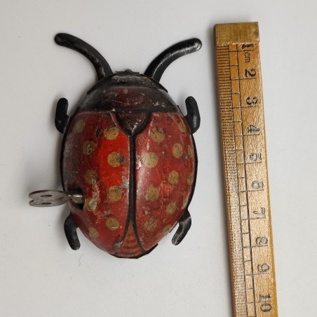 Giocattolo di latta coccinella con carica meccanica a chiave
