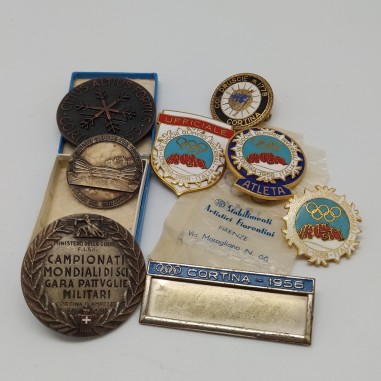 Lotto di 8 spille e medaglie di sci Olimpiadi Cortina anni 1941/55/56