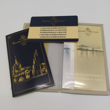 Garanzia e libretto orologio Baume & Mercier in custodia. Dettagli logori