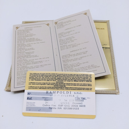Garanzia e libretto orologio Baume & Mercier in custodia. Dettagli logori