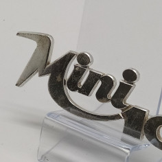 Placca metallica scritta originale "Mini 1001" segnata. 2