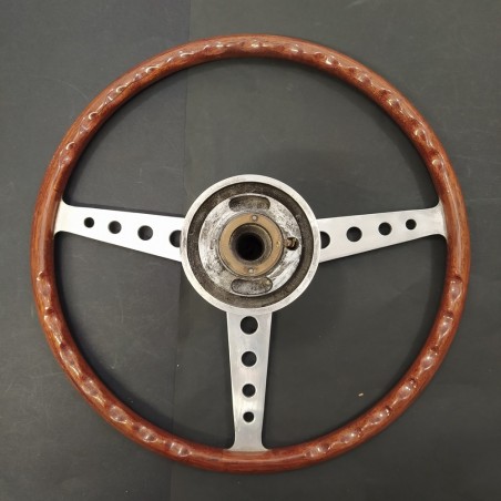Volante in legno firmato Hellebore con diametro 38 cm. Lunga scheggiatura
