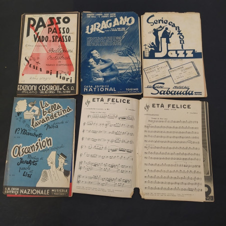 Lotto di 10 riviste con spartiti di musica leggera anni '30/'40. Segni del tempo