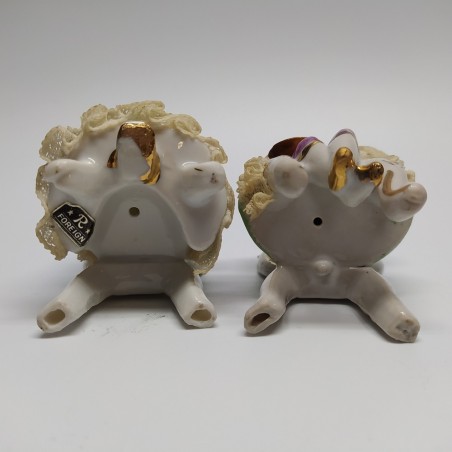 Coppia di ceramiche figurini settecenteschi suonatore e damina