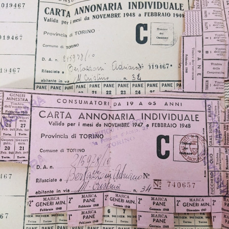 Lotto di 7 carte annonarie individuali del 1947-48 del giornalista Bertazzoni