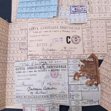 Lotto di 7 carte annonarie individuali del 1947-48 del giornalista Bertazzoni