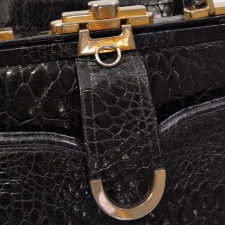 Borsa donna a mano in cocodrillo nero anni 50/60 con finiture in metallo giallo