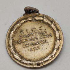 Medaglia FIGC Direttorio Lombardia in argento calcio XII e.f. 1934. Macchie 2