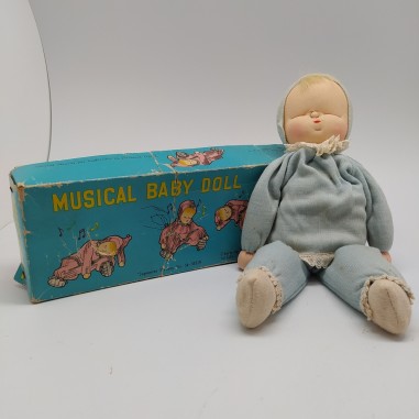 Bambolina giapponese con carillon Musical Baby-Doll con confezione. Macchie