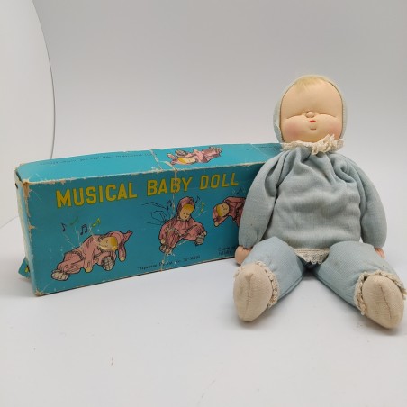 Bambolina giapponese con carillon Musical Baby-Doll con confezione. Macchie