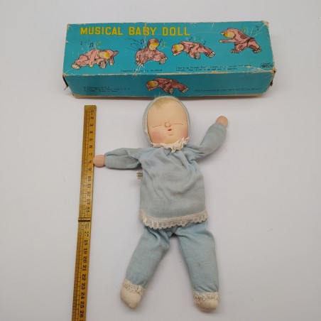 Bambolina giapponese con carillon Musical Baby-Doll con confezione. Macchie