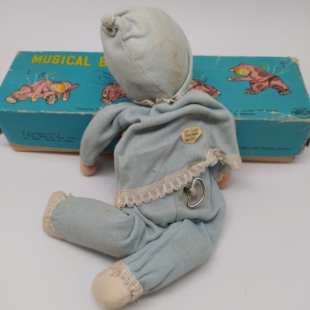 Bambolina giapponese con carillon Musical Baby-Doll con confezione. Macchie
