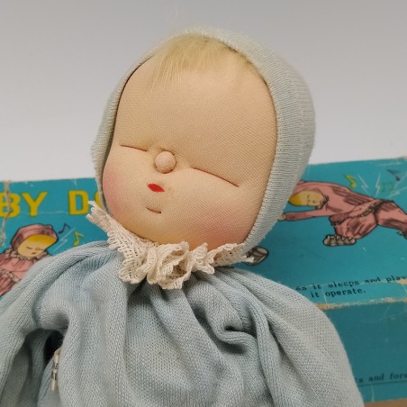 Bambolina giapponese con carillon Musical Baby-Doll con confezione. Macchie