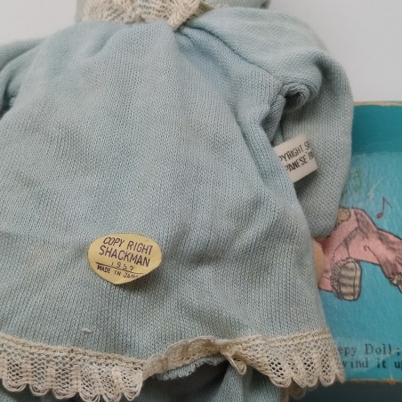 Bambolina giapponese con carillon Musical Baby-Doll con confezione. Macchie