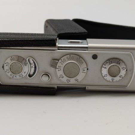 Fotocamera miniaturizzata Minox in fodero con catenella. Buono