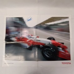 Poster con auto di Formula 1 con l'autografo di Jarno Trulli. Pieghe 2