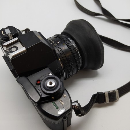 Macchina fotografica Nikon EM con obiettivo 50 mm 1:1,8 con laccetto. Buono