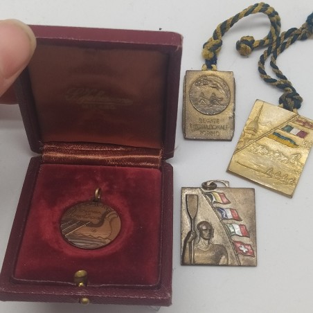 Lotto di 4 medaglie Federazione Italiana Canottaggio anni '40-'50. Ossidazione