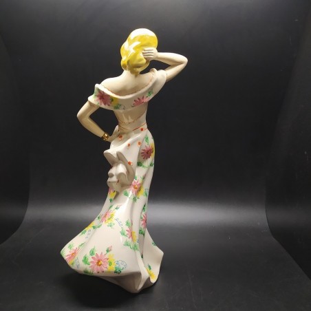 Ceramica elegante donna con gonna floreale piccoli difetti h. 39 cm