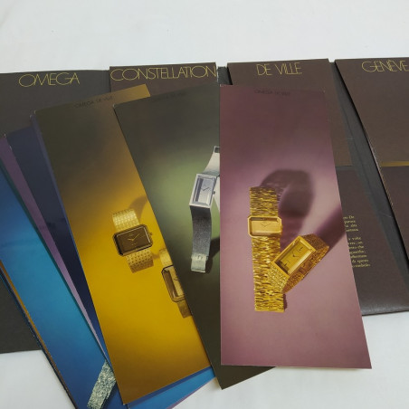 Catalogo a cofanetto "Orologi & Stile Omega" con cartoncini di tre collezioni