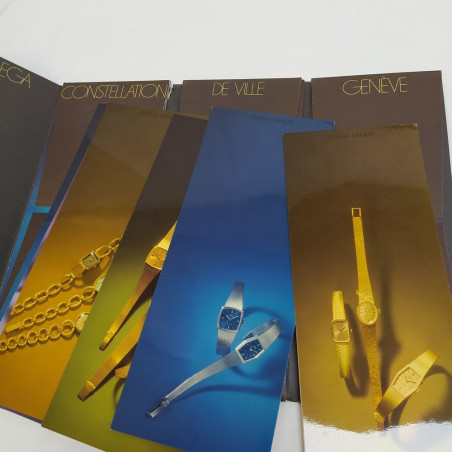 Catalogo a cofanetto "Orologi & Stile Omega" con cartoncini di tre collezioni