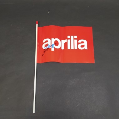 Bandierina Aprilia con autografo Biaggi con pieghe con bastoncino in plastica