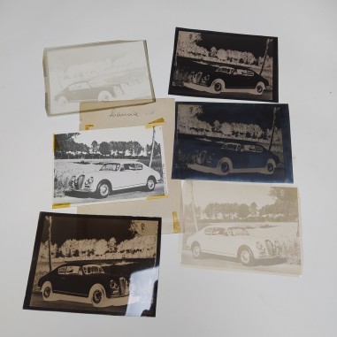 Lotto di 5 negativi fotografici e una fotografia della vettura Lancia B20. Segni