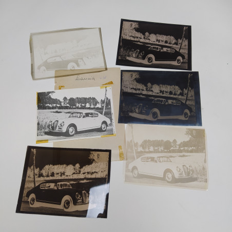 Lotto di 5 negativi fotografici e una fotografia della vettura Lancia B20. Segni