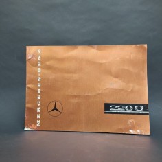 Catalogo automobili Mercedes-Benz 220S in francese con aloni e macchie