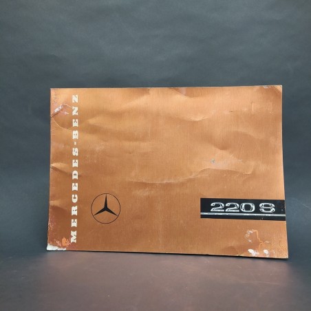Catalogo automobili Mercedes-Benz 220S in francese con aloni e macchie