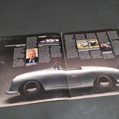 Catalogo automobili Porsche, edizione 1990 in inglese con pieghe e strappi