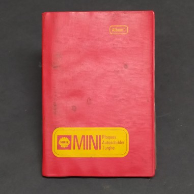Raccoglietore con 15 mini targhe metalliche Shell. Macchie in copertina