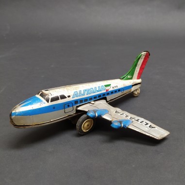 Aereo giocattolo in latta velivolo Alitalia n. 715 con meccanismo a molla