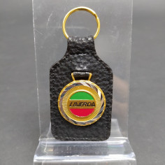 Portachiavi Laverda in pelle nera con logo a medaglia smaltata basculante. Buono