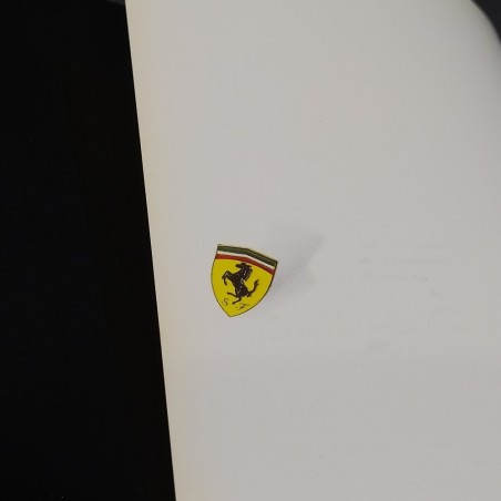 Volume Annuario Ferrari 1991 con copertina parzialmente scollata. Mediocre