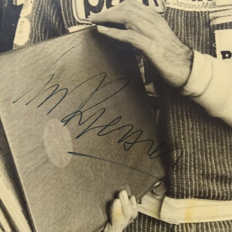 Fotografia del pilota Clay Ragazzoni con autografo. Condizioni mediocri
