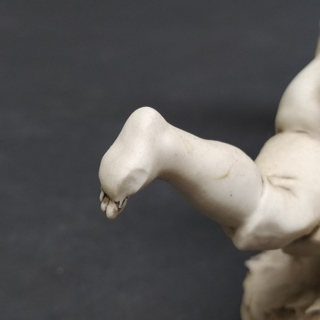 Gruppo ceramico bisquit Triade Benacchio bambini su altalena