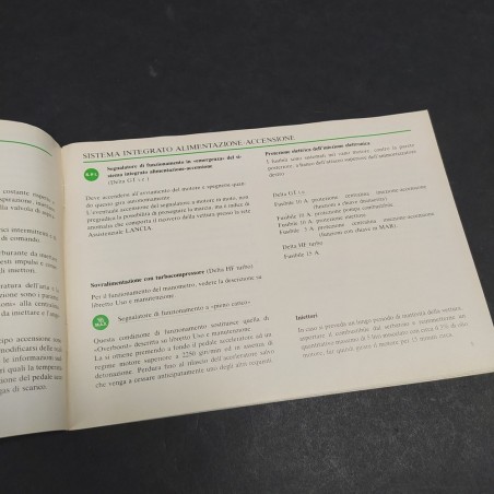 Libretto multilingue per vetture Lancia Delta con convertitore, 1990. Fioritura
