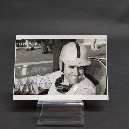 Fotografia del pilota di F1 Jack Brabham con autografo, anni '60. Discreta